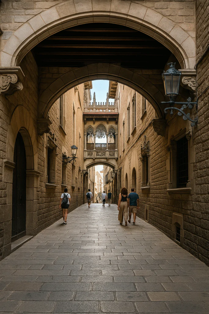 Panoramic view of Park Güell’s mosaic architecture overlooking Barcelona city and the Mediterranean Sea under a clear blue sky.